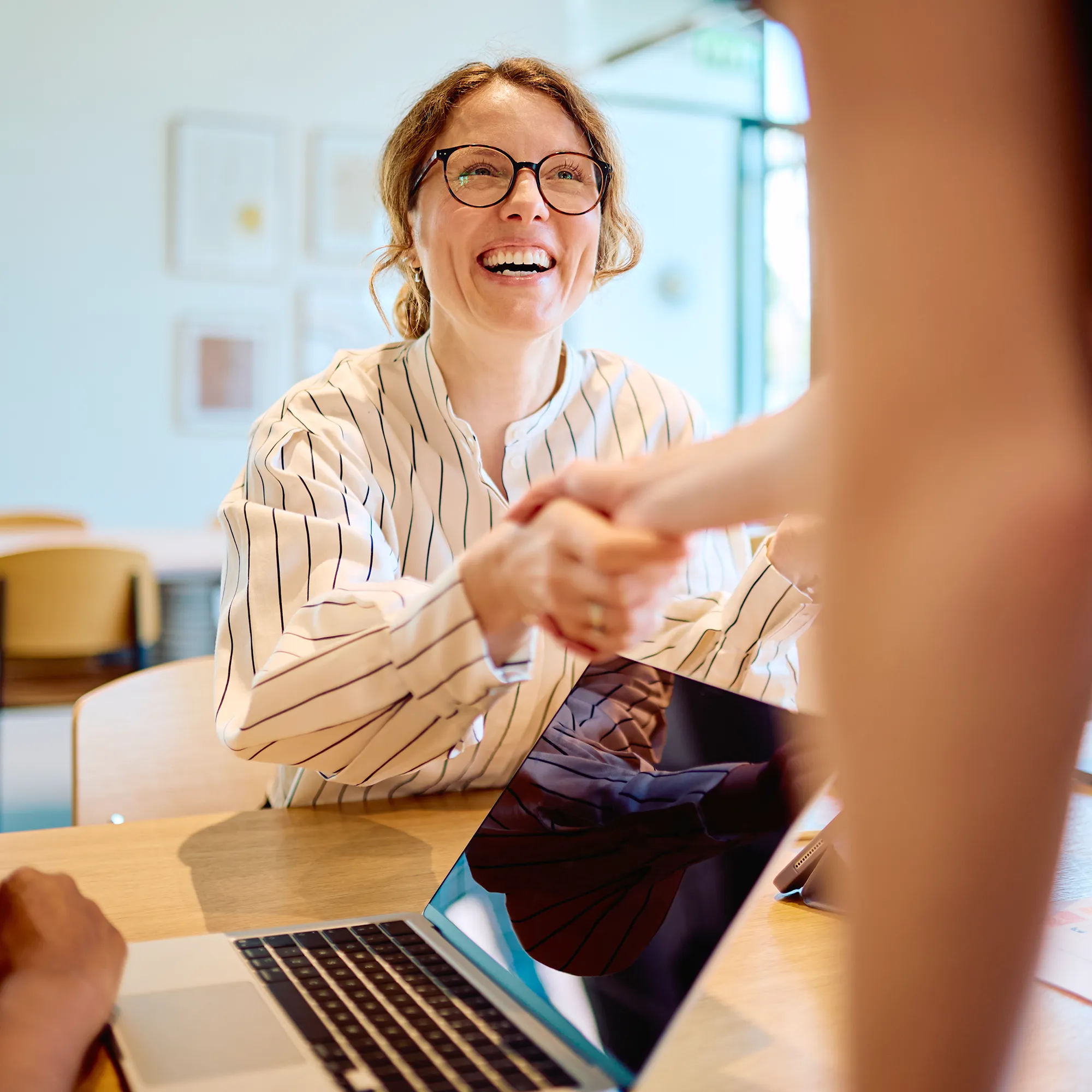 AlaCOMP representative speaking with a client